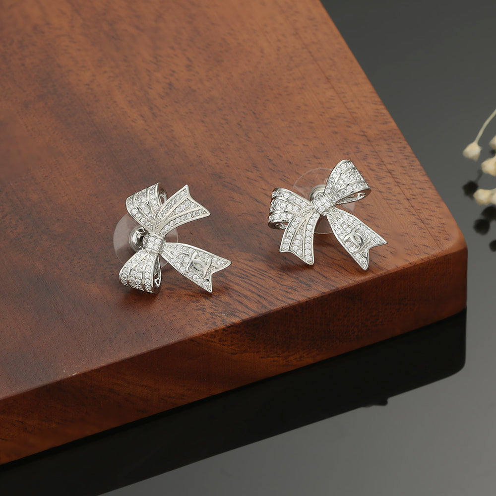 18K  Chanel Bow Tie Diamond Earrings